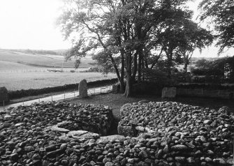 Excavation photograph : looking across chamber to south-west.