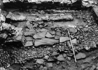 Excavation of the casemates, the medieval cobbled surface in the parade ground, and the medieval remains in the SW casemate.