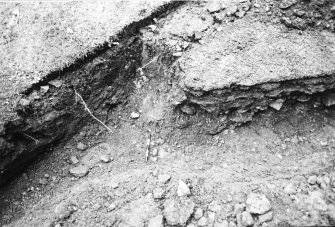 Excavation photograph : north section and base of southern track (east - west)