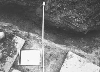 Excavation photograph - Trench III: opposite door leading onto basement of refectory, showing 1975 backfill - from N