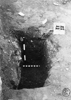 Ring-ditch: postholes, ditch segments, horns and beaten gravel deposits.