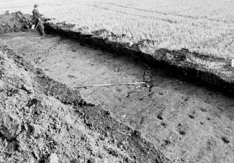 Excavation photograph : old stream course in north-west corner of area 7.