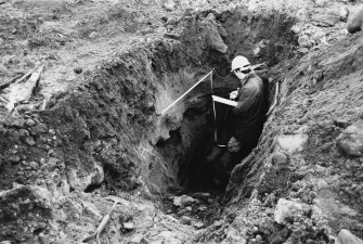 Excavation photograph : David Perry drawing west facing main section of trench A.