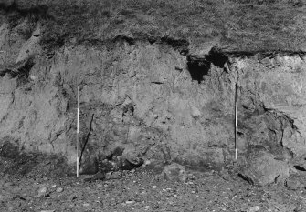 Excavation photograph : overlap to B/59232, west end of section, from south-east.