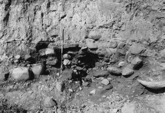 Excavation photograph : feature 103 plus possible hearth.