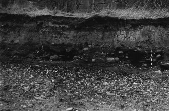 Excavation photograph : relationship between features 102 and 103.