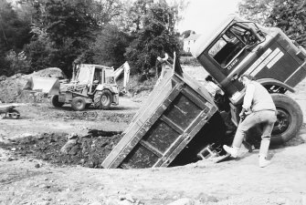 Jedburgh Abbey excavation archive
Frames: 3-8: Lorry in collapsed mill lade
Frame 9: Collapsed mill lade after removal of lorry
Frames 10-11: Assembling for team photographs
Frames 13-14: Team photographs
Frames 15-17: Area 1: E range and Trench J in September 1984. From N.