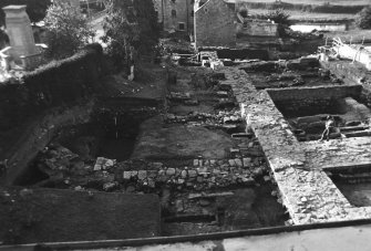 Jedburgh Abbey excavation archive
Frames 18-19: Yard of No 4 Abbey Bridge End, showing wall 1113 partially exposed, from E
Frames 20-21: Yard of No 4 Abbey Bridge End, showing wall 1113 partially exposed, from S
Frames 22-23: Yard of No 4 Abbey Bridge End, showing wall 1113 partially exposed, from W
Frames 24-31: General views of Trench J, showing E end of extended chapter house, from N
Frames 32-33: Trench J: grave 1109, from W
Frames 34-35: Trench J: deposits overlying wall 960, from W
Frame 36: Unidentified