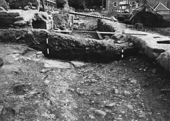 Jedburgh Abbey excavation archive
Frames 22-23: Area 2: Trench F: Section between 502 and 378, showing 557 and 551. From W.
Frames 24-25: Area 2: Trench G: W end of 400, showing capstones of drain 386. From W.
Frame 26: blank
Frame 27: Area 2: Trench G: Sondage through E end of 400, complete. From N.
Frames 28-30: Area 2: Trench F: view of trench and surroundings from above.
Frames 31-34: Area 2: Trench D: view of trench and surroundings from above.
Frames 35-36: Area 1: General views.
Frame 37: Area 2: visitors.