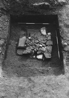 Jedburgh Abbey excavation archive
Frames 20-21: Area 3: Trench Q: Drain 1220. Detail from E.
Frame 22: Area 3: Trench Q: Drain 1220. From E.
Frames 23-26: Area 3: Trench Q: Eastern outlier of Trench Q. Column base 1225. From N.
Frames 27-29: Area 3: Trench Q: NW extension. From N.
Frames 30-34: Area 3: Trench R: First extension. Patchy mortary floor 1230, robbing 1228 removed. From W.
Frames 35-37: Area 2: General view, whole area and church. From SW.