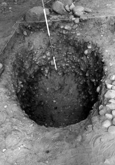 Excavation photograph : post ex of grave pit 017a.