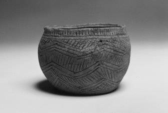 Post excavation photograph : food vessel bowl from cist 3 (SF 26).