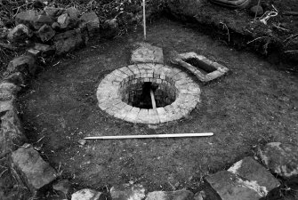 Fairfield House - Well Excavation
Frame 19 - Cap and plinth removed - from north
Frame 20 - Lead pipe - from east