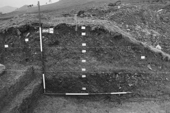 Excavation photographs: Film 1; excavation of rampart; includes contexts 113-119; sections.
