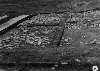 Excavation photographs: Film 15; Trench VI; Trench VII; shots from tower; details of stones and contexts.