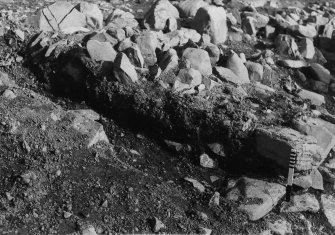 Excavation photographs: Film 35; Trench VI; unidentified details of stone features.