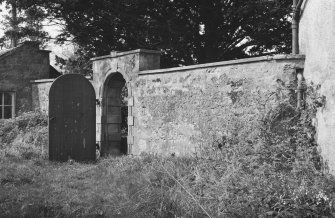 General view of wall and gateway, Cessnock Castle.