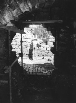 Craignethan Castle
Excavations 1984
Frame 4 - View into the basement of tower through gap formed from collapsed fireplace in its south wall - from south
