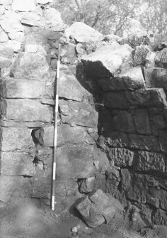 Craignethan Castle
Excavations 1984
Frame 11 - Detail of north-west corner of tower showing first few courses of arch of basement roof - from east
