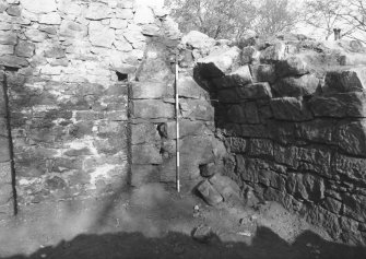 Craignethan Castle
Excavations 1984
Frame 6 - North-west corner of tower showing blocked doorway in west wall and springers of arched basement - from east
