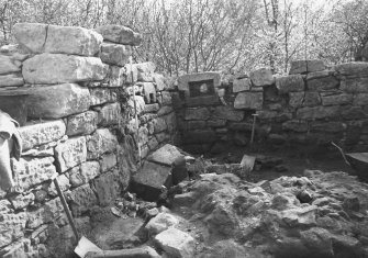 Craignethan Castle
Excavations 1984
Frame 33 - North side of basement, showing kiln and trough partially revealed - from west

