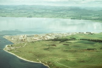 Aerial view of Nigg yard and Oil Storage tanks with Nigg Bay, Cromarty Firth, looking WNW.