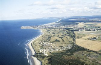 Aerial view of Covesea and Lossiemouth, Moray, looking E.