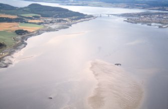 Aerial view of Coulmore and Carn Dubh Crannogs, near North Kessock, Black Isle, looking E.