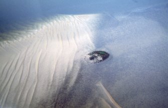 Aerial view of Carn Dubh crannog in the Beauly Firth, looking NE.