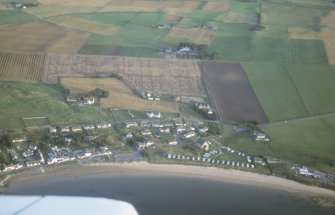 Aerial view of Portmahomack village and excavation, Tarbet Ness, Easter Ross, looking SE.