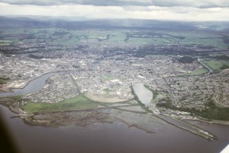 Aerial view of Longman Harbour and mouth of the Caledonian Canal at Clachnaharry, Inverness, looking SE.