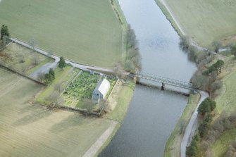 Aerial view of Cromdale Church and graveyard with Boat of Cromdale Bridge, Strathspey, looking SSW.