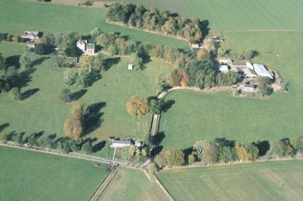 Aerial view of Balbegno Castle and Mains of Balbegno Farm, Fettercairn, Moray, looking NW.