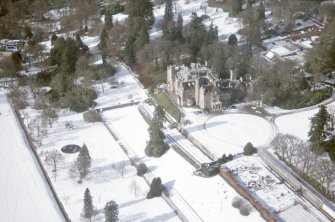 Aerial view of Skibo Castle and Gardens under snow, East Sutherland, looking NW.
