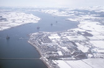 Aerial view of Invergordon and the Cromarty Firth under snow, looking WSW.