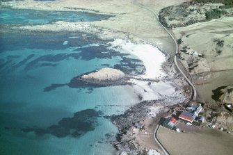 Aerial view of Gallanach Farm and Lodge, Muck, Small Isles, looking E.