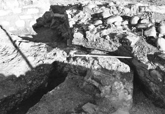 St Monance Saltworks
Excavations 1990-1996
Frame 12 - Panhouse 7: brick lining and south end of east siege - from south-west

