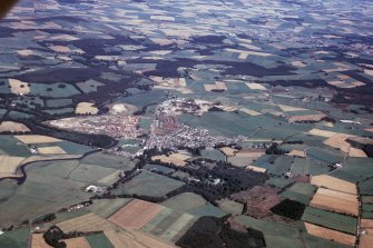 Aerial view of Kemnay and Kemnay House, near Inverurie, Aberdeenshire, looking NNE.