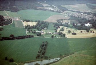 Aerial view of Gordon Castle with part of Fochabers behind, Moray, looking S.