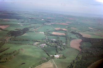 Aerial view of Glenbervie, SE of Stonehaven, Aberdeenshire, looking E.