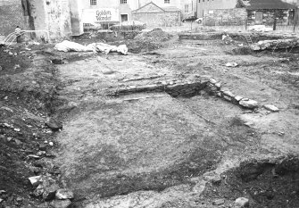 Skeletons SK11; area 2; grave 121; ditch 117 and stake holes 142-157 & 279; robber trench 109; general views; and oven 161.