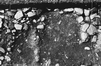 Excavation photograph : trench H - photogram - L1 removed showing L129-134 - E77.5-79, N62-64.

