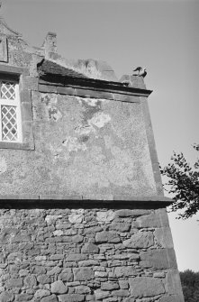 Detail of entrance elevation showing stone pigeon on gable, Johnstounburn House dovecot.