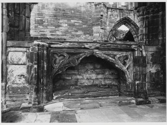 Elgin Cathedral Chapter House Window No 1 + Tomb in St Mary's Aisle.  Effigy Bishop John Pilmore