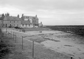 Distant view of 1-2 Harbour Head, Cellardyke, from south west.