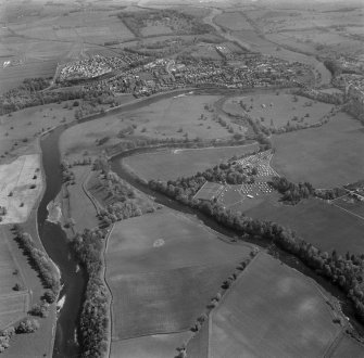 Oblique aerial view centred on the remains of Roxburgh Castle and Springwood House.