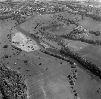 Oblique aerial view centred on the remains of Roxburgh Castle.