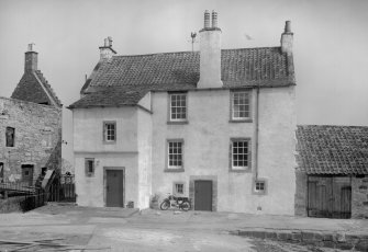 General view of front of Gyles House, Pittenweem, with motorbike.