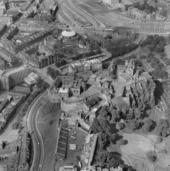 Oblique aerial view showing Edinburgh Castle, the Usher Hall and former station offices on Lothian Road, Edinburgh.