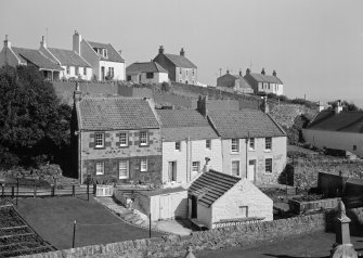 General view of 39-42 Burnside and Waterside cottage, St Monance, from south west.